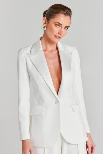Nadine Merabi - 🔥🔥 Our stunning 'STELLA' white dress is back in stock.  Shop online at nadinemerabi.com #designer #eveningwear #whitedress  #handmade